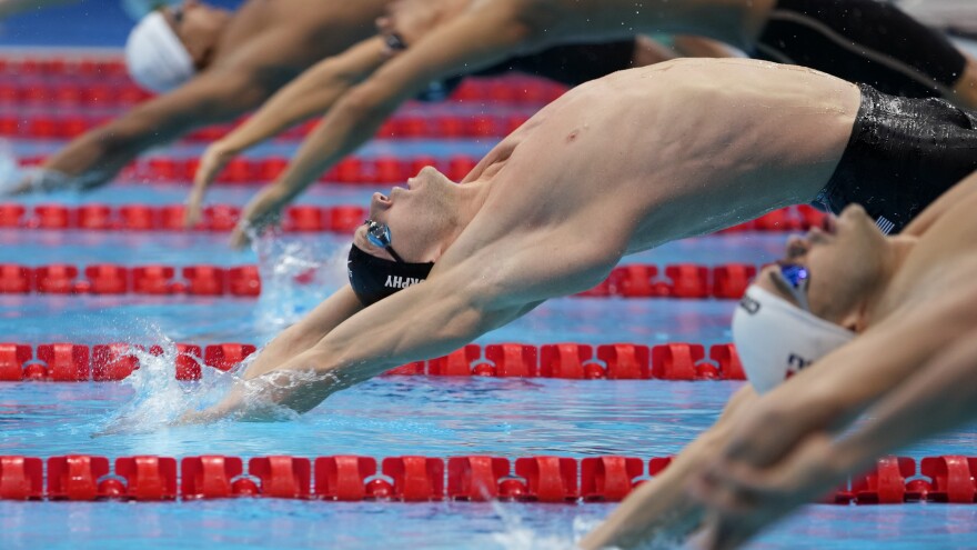 Ryan Murphy of the United States swims during a semifinal in the men's 100-meter backstroke at the 2020 Summer Olympics, Monday, July 26, 2021.