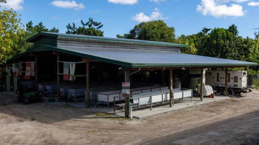 A large pavilion holds multiple compost bins at Lion Fruit Farms, in Homestead.