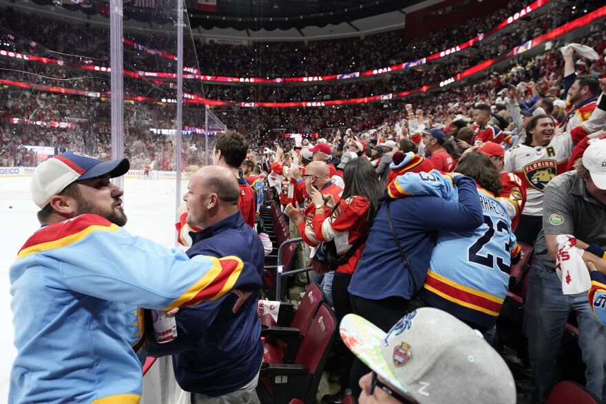 Fans react after Florida Panthers left wing Matthew Tkachuk scored a power-play goal with 4.9 seconds left in the third period of Game 4 of the NHL hockey Stanley Cup Eastern Conference finals against the Carolina Hurricanes, Wednesday, May 24, 2023, in Sunrise, Fla.