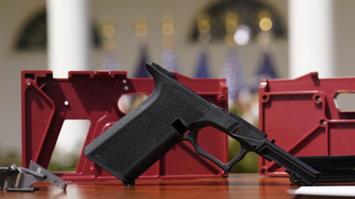 FILE - A 9mm "ghost gun" pistol build kit with a commercial slide and barrel with a polymer frame is displayed in the Rose Garden of the White House, April 11, 2022, in Washington. Massachusetts Gov. Maura Healey signed a sweeping gun bill into law Thursday, July 25, 2024, that supporters say builds on the state’s existing gun laws, including a crackdown on difficult to trace “ghost guns,” while safeguarding the rights of gun owners. (AP Photo/Carolyn Kaster, File)