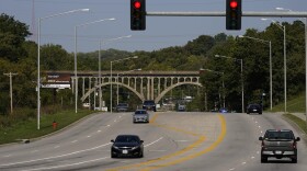 Cars travel under a landmark railroad viaduct in Kansas City, Mo. (Charlie Riedel/AP)