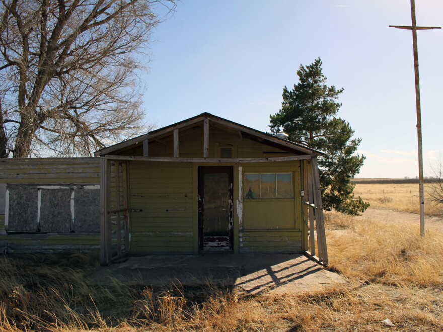 An abandoned gas station is one of the last few remaining buildings at Dearfield.