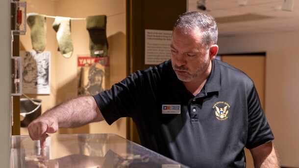 Texas Heritage Museum Director John Versluis points out a gun on display during a museum tour on March 2, 2026.