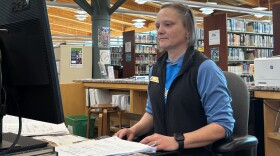 Grand Rapids Director of Library Services Amy Dettmer works Nov. 21, 2025, at the Grand Rapids Area Library.