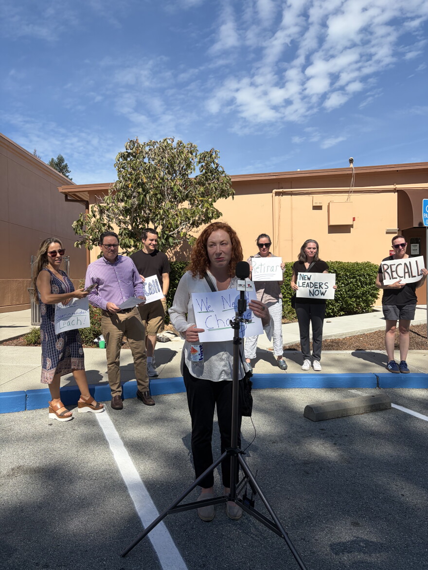 Olga Yushina speaks outside the Sequoia Union High School District offices on Sept. 9, 2026.