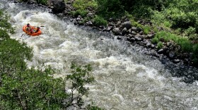 A raft from Noah’s River Adventures hitting the first small rapids after departing from Spring Island on the Upper Klamath River in June, 2023.