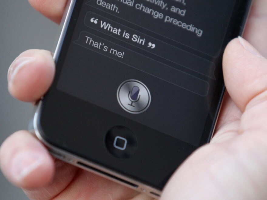 Siri, iPhone's robot assistant, responds to voice commands so users can keep their hands on the wheel. But does keeping your hands on the wheel while driving make texting any safer?