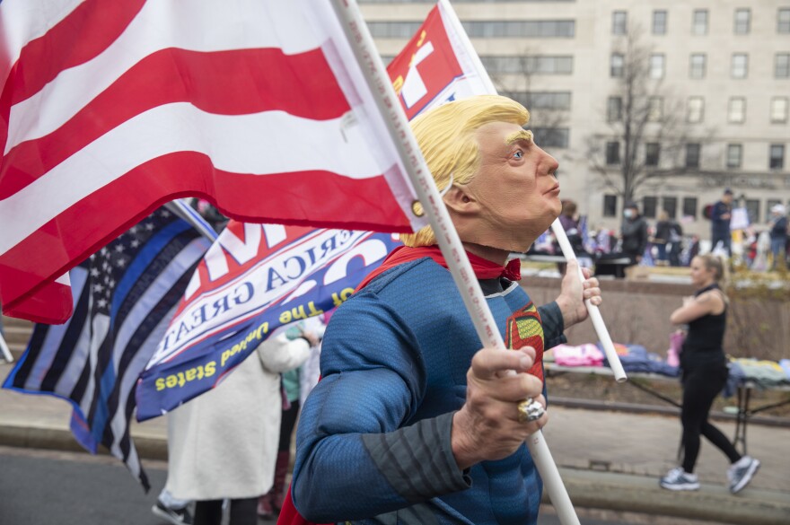 A supporter of President Trump joins the protest against the results of the election.