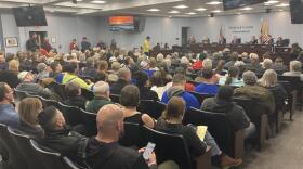 Frederick County residents wait their turn to speak out on data centers at a public meeting the week before the vote