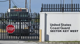 FILE - Buses carrying Cuban migrants leave from U.S. Coast Guard Sector Key West, Thursday, Jan. 5, 2023, in Key West, Fla. The Coast Guard has returned another 177 Cuban migrants who were caught at sea to the island. A Coast Guard news release said the migrants were all intercepted off Florida's coast in separate incidents earlier this month. They were repatriated by two Coast Guard cutters on Thursday, Jan. 12. (AP Photo/Wilfredo Lee, File)
