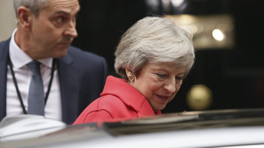 British Prime Minister Theresa May leaves No. 10 Downing St. for the Houses of Parliament on Thursday. Her address there defending the tentative Brexit deal did little to calm critics — both among her political rivals and within her own part