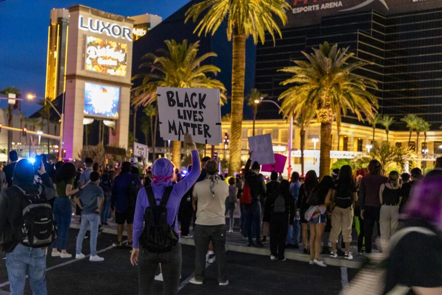 Protesters gather along the Las Vegas Strip Sunday night.