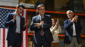 Speaker of the House Mike Johnson points to Rob Bresnahan during a rally in at DeAngelo Contracting Services in Ha