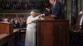 Pope Francis shakes hands with then Speaker of the House John Boehner during a speech before Congress in 2015.