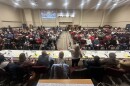 Image of people in a community room at St. John Missionary Baptist Church in Springfield. A panel of municipal leaders and local nonprofits fielded questions regarding the fate of the city’s estimated 12,000-15,000 Haitians once Temporary Protection Status ends.