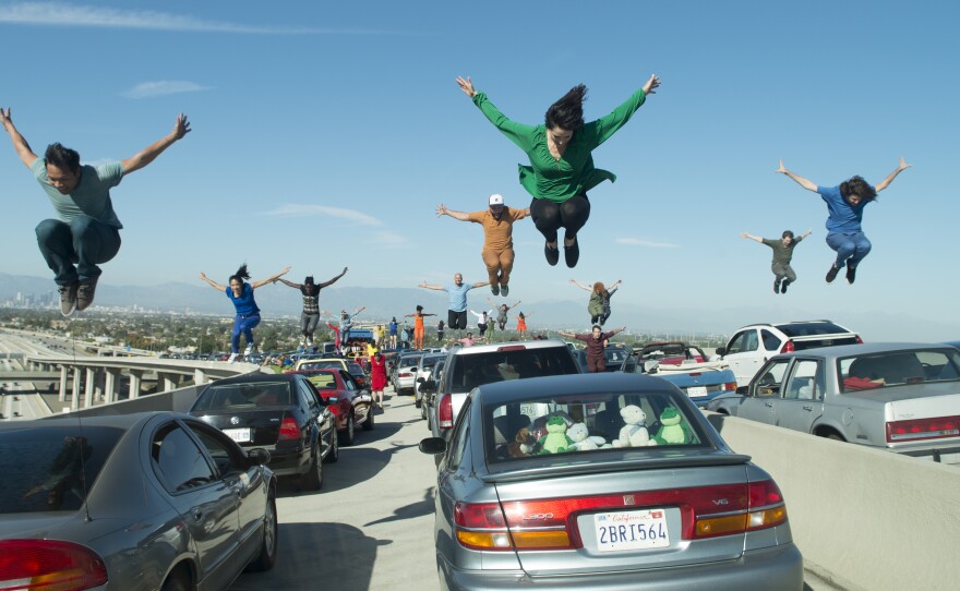 The opening musical number of <em>La La Land</em> takes place on the freeway during a massive traffic jam.