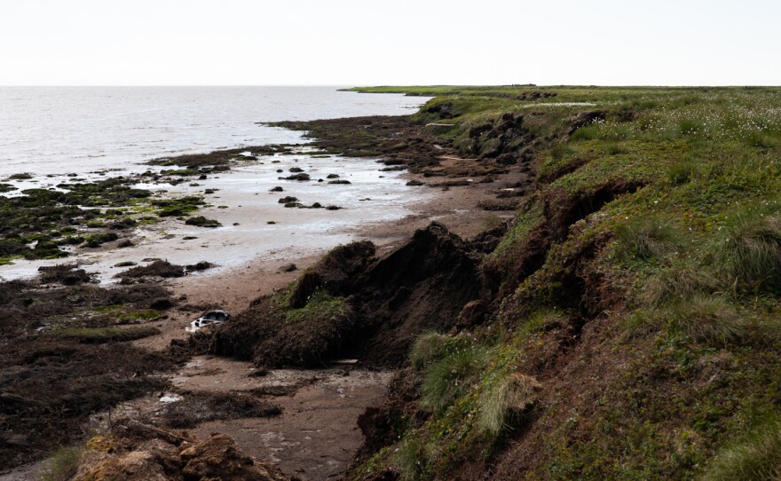The banks of the Ninglick River continue to erode, eating away at the land in Newtok, Alaska. July 12, 2020.