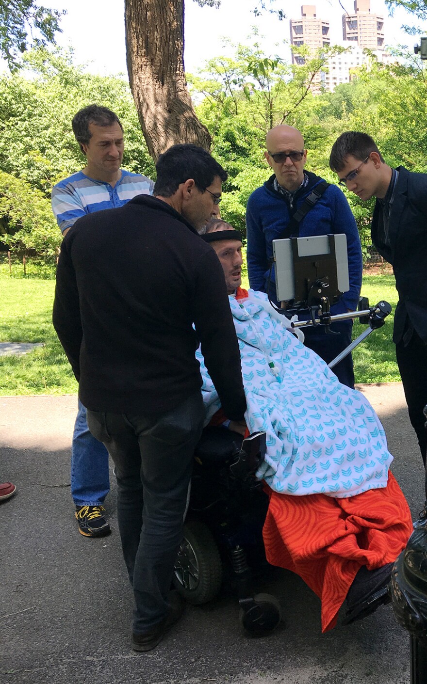 Family members surround Adox on the day that he died last May. His wish to die in a hospital so that he could donate his organs turned out to be difficult to fulfill.
