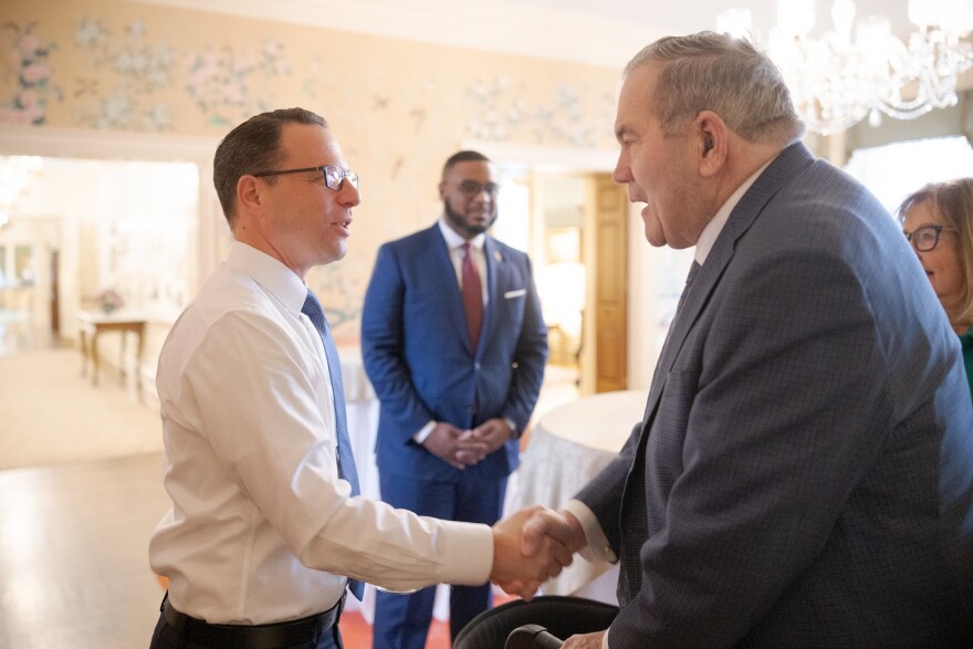 FILE - Gov. Josh Shapiro (left) greets former Gov. Tom Ridge (right) as Lt. Gov. Austin Davis looks on. (Commonwealth Media Services)