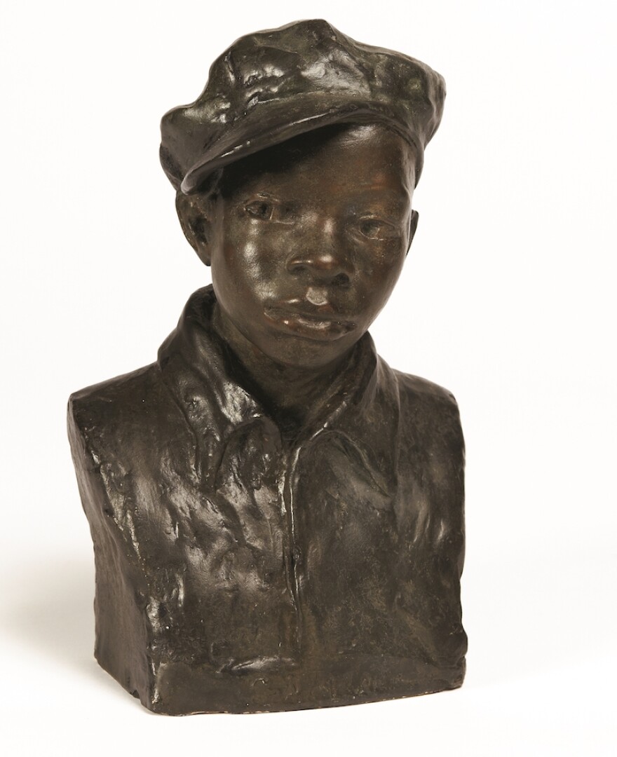 color photo of augusta savage sculpture called gamin