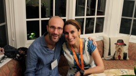 Guy Ben-Aharon (left) and Eman Ansari sit together at a gathering of local group "The Jar"