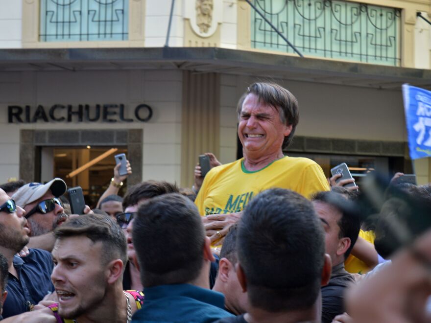 Brazilian right-wing presidential candidate Jair Bolsonaro gestures after being stabbed in the stomach during a campaign rally in Juiz de Fora, Minas Gerais state, in southern Brazil, on Thursday.