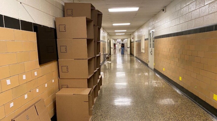 Moving boxes line the hall on the very last day of school for Park Road Montessori.