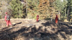 A juvenile inmate crew from Naselle Youth Camp in Southwest Washington. There were 30 kids part of the fire effort until last week, when a 16-year-old broke free, assaulted one of his supervisors and stole a gun. 