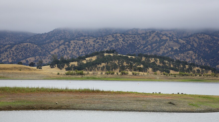Lake Berryessa is seen with mountains in the background.