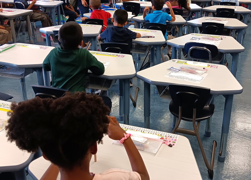 Students sit at their desks on the first day of classes in the Buffalo Public Schools district, Thursday, Sept. 3, 2026. Names, where legible, have been covered to preserve the students' privacy and safety.