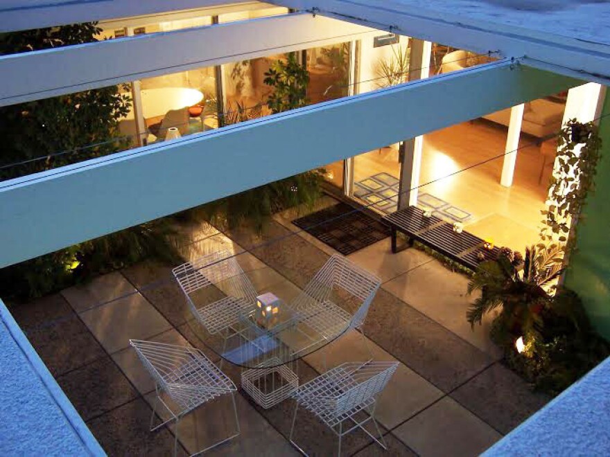 Adriene Biondo has been living in an Eichler home for 20 years — the atrium of her home is pictured above. "It's not like living in a normal house at all," she says. "There's nothing conventional about it."