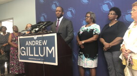 Gillum speaks at a press conference to propose his education plan.