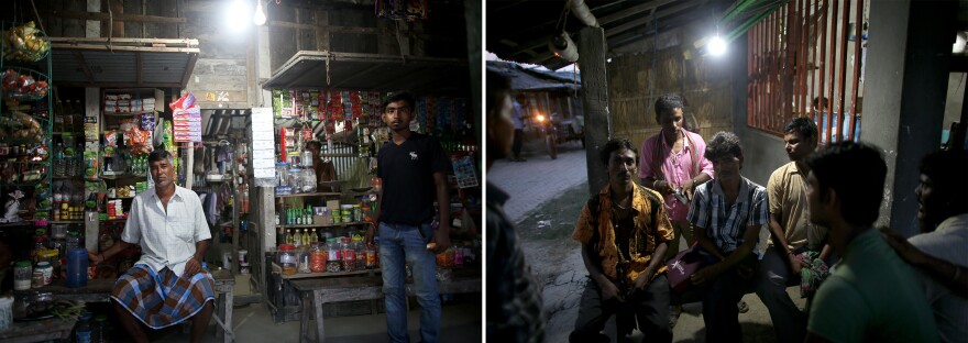Before solar lighting, people in Rajat Jubilee stayed home after dark. There was nothing to do outside, and you might get bitten by a snake or attacked by a tiger. Now, when the sun goes down, the village comes to life. A store owner (left) is able to keep his shop open at night. A television (above) stays on for people to watch in the shop. Villagers (right) sit outside a restaurant.
