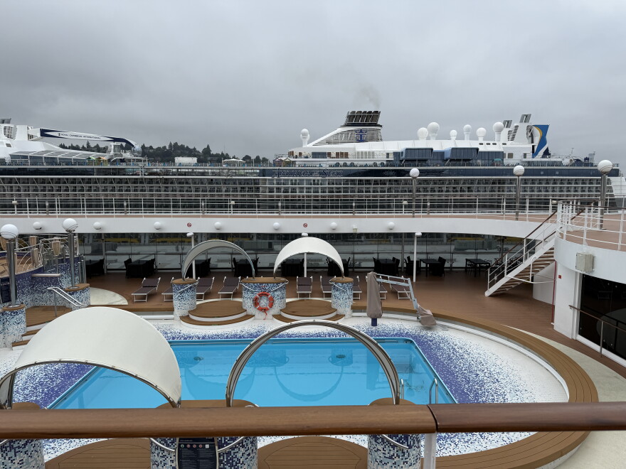The MSC cruise ship Poesia, foreground, is docked next to Royal Caribbean's Anthem of the Seas at the Port of Seattle on Aug. 10, 2026.