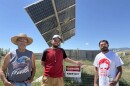 Western Shoshone elder Tommy LeBeau, left, Aaron Day, center, and Austin Hill stand next to the fully-operational solar installation at LeBeau’s place.