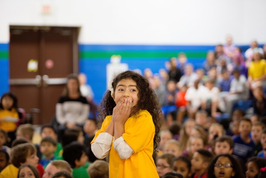 Tarannom Rajaee reacts to the announcement that she won the statewide Doodle 4 Google contest.