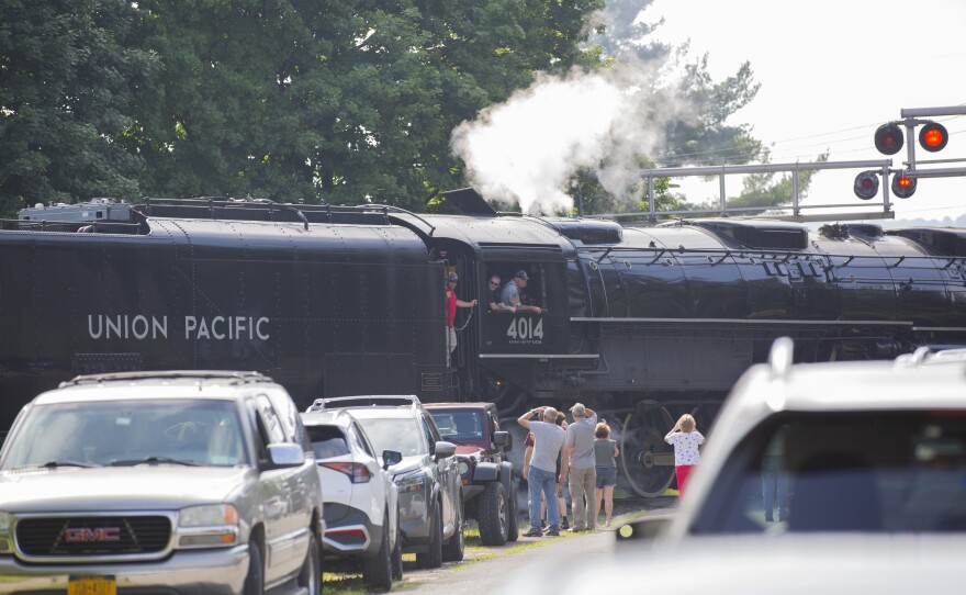 Drivers got out of their cars as they waited for Big Boy to cross a street in Sayre on Friday morning.