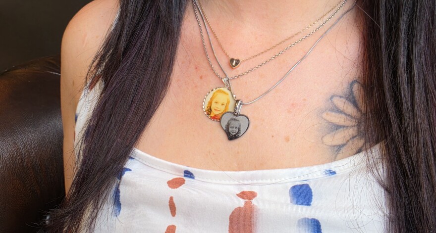 Rebecca Reed wears three necklaces in honor of her daughter.