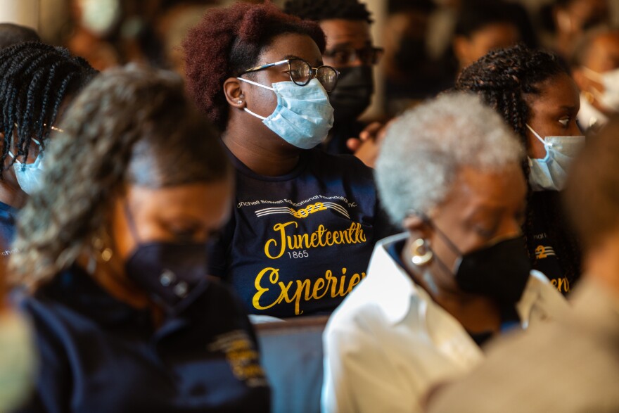 Students from the Franchell Boswell Educational Foundation listen to a Juneteenth presentation at Avenue L Baptist Church.