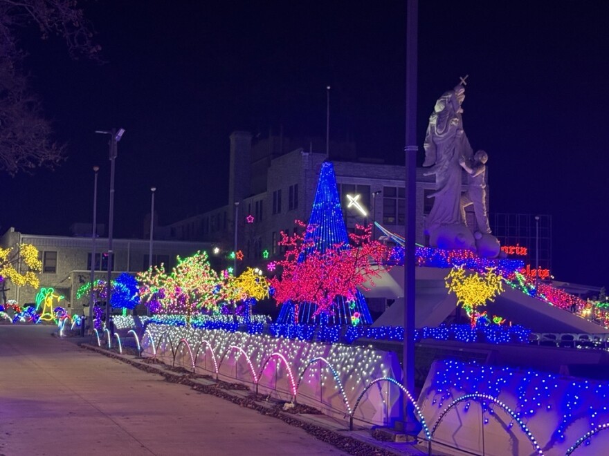 The main courtyard at the campus of the Congregation of the Mother of Redeemer has a large Christmas tree and LED trees