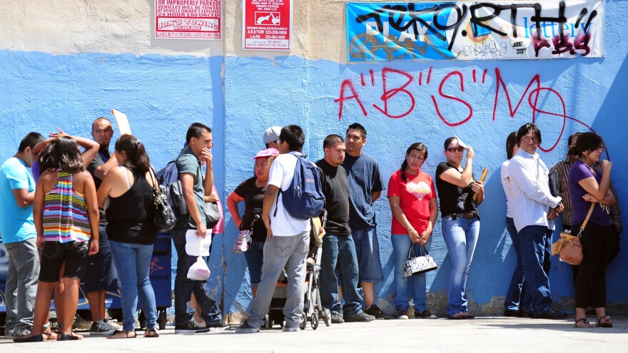 Young people wait in line to enter the Coalition for Humane Immigrant Rights of Los Angeles office on the first day of the Deferred Action for Childhood Arrivals program in August.
