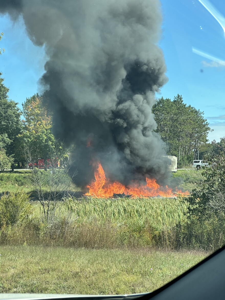 Fire burning after the military plane crash. The plane went down shortly before 2pm on Thursday.