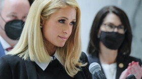 Paris Hilton, who has spoken out about the abuses she said she experienced at Provo Canyon School, center, was an advocate for the new law along with Utah Gov. Spencer Cox Cox and Lt. Gov. Deidre Henderson. Activists and supporters gathered in the Capitol rotunda, April 6, 2021 for a ceremonial bill signing of SB127 that will bring more oversight to the state's so-called troubled-teen industry.