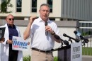 Democratic U.S. Senate candidate Alex Vindman speaks outside the Florida Capitol on Thursday, where he called on Senator Ashley Moody to release the grand jury report tied to the Hope Florida scandal.