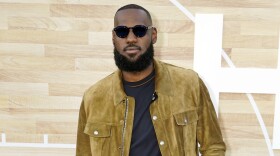 LeBron James poses at the premiere of the film <em>Hustle</em> on June 1 at the Regency Village Theatre in Los Angeles. James' net worth recently broke $1 billion, making him the first ever active NBA player to become a billionaire.