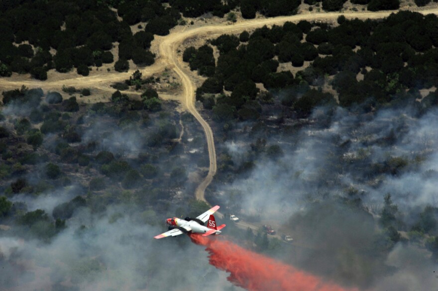 Fire bosses say more humid weather will help them get a handle on blazes that have scorched over 1.4 million acres across Texas.