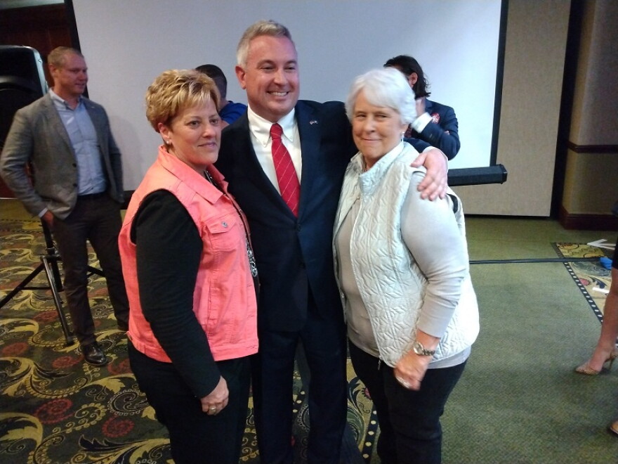 Commissioner of Agriculture Ryan Quarles posed for photos with supporters Tuesday night after finishing second in the race for the GOP gubernatorial nomination.