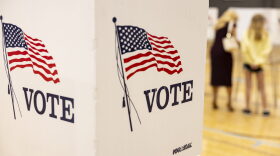 A woman votes with her child at the Michael O. Buchanon park voting location in Bowling Green, Ky., on Tuesday, May 21, 2024. (Austin Anthony for The Kentucky Lantern)