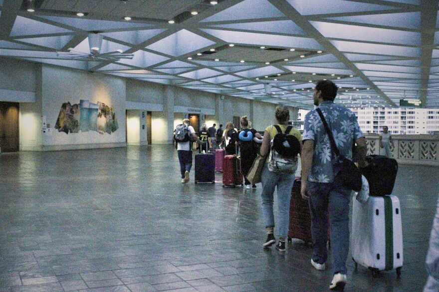 More than 11,000 visitors flew out of Maui to escape the flames.