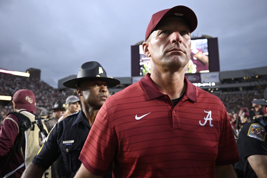 Alabama head coach Kalen DeBoer, front, leaves the field after a loss to Florida State in an NCAA college football game, Saturday, Aug. 30, 2025, in Tallahassee, Fla. (AP Photo/Phelan M. Ebenhack)